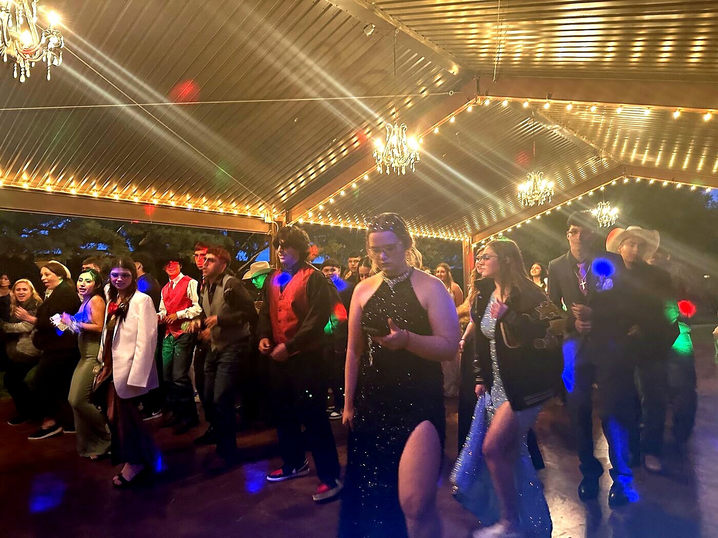 Wedding dance floor packed with guests